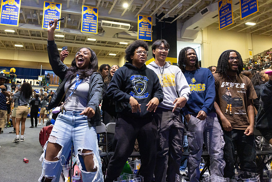 group of students at new student orientation reacting